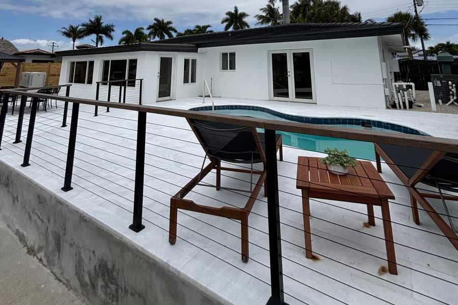 Waterfront home terrace overlooking a canal in East Pompano Beach